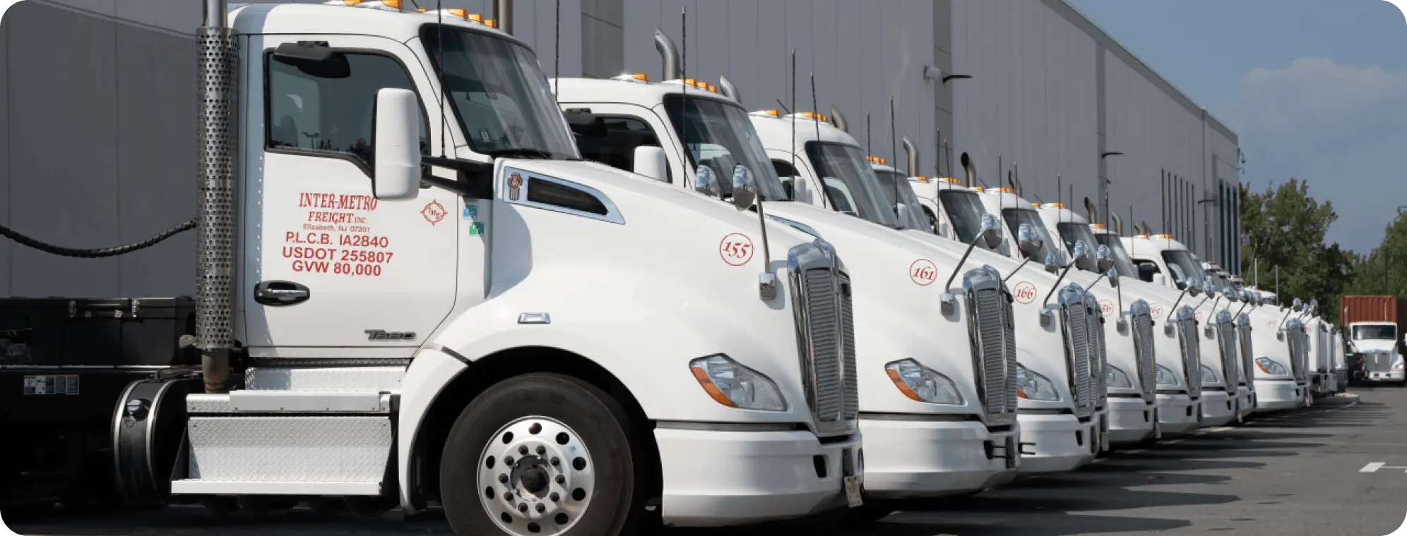 IMFI trucks lined up at their facility.