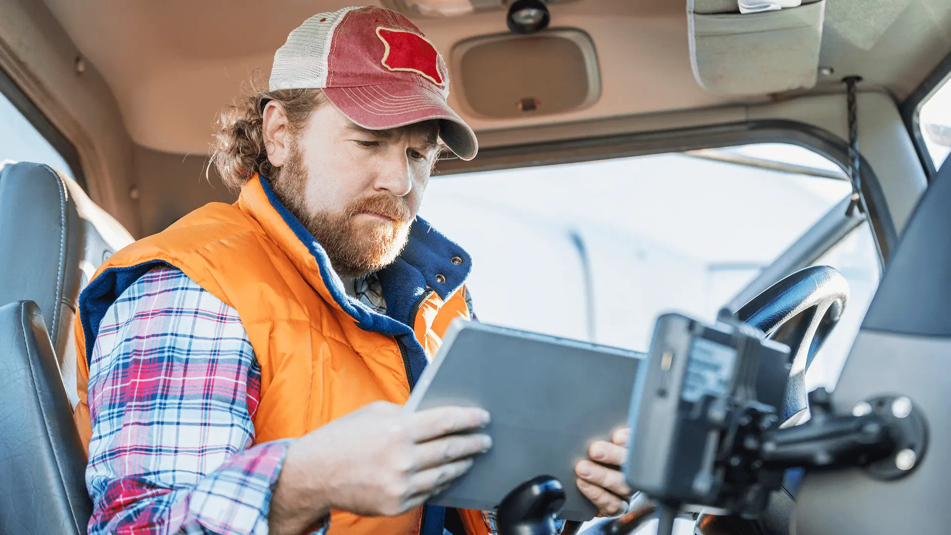 Truck driver using FMCSA-certified ELD solution