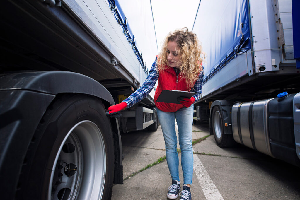 Fleed driver performing pre-trip inspection.