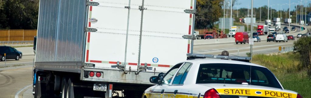 State police pulls over a truck. CSA Scores can be dramatically affected by a negative inspection.