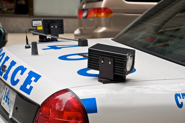 Automated license plate reader mounted on a police car.