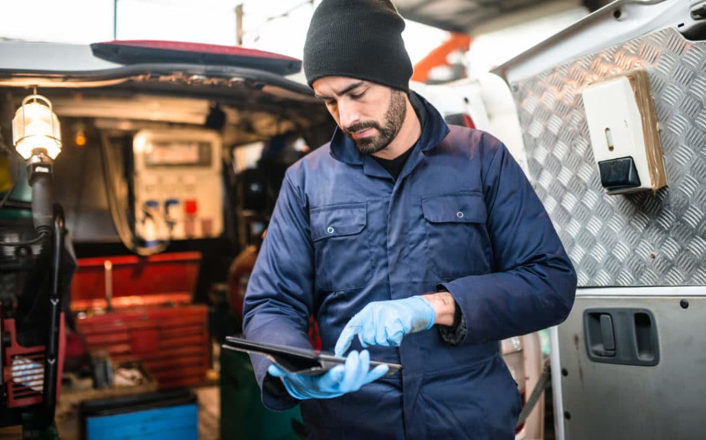 Driver completing an electronic DVIR.