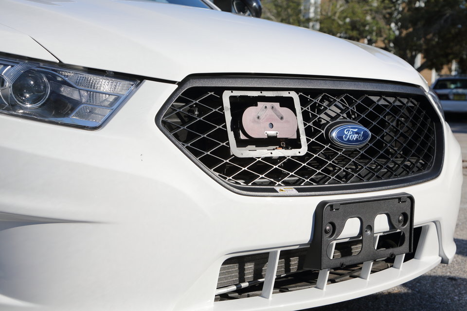 Advanced GPS tracking technology on a police cruiser.