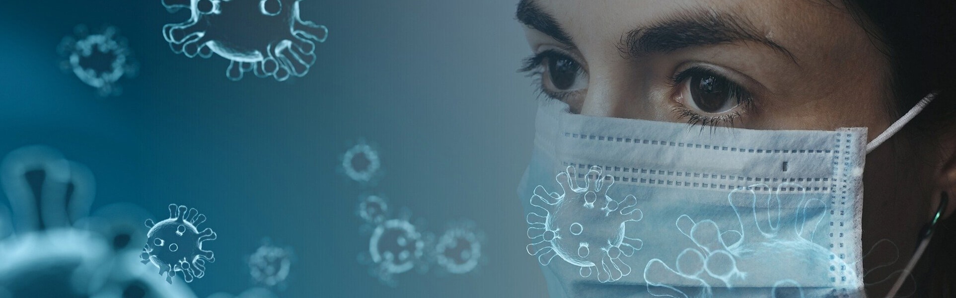 a woman wears a face mask with the cornavirus particles floating around the image