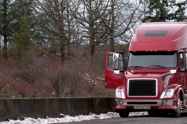 police pull over red truck for road inspection