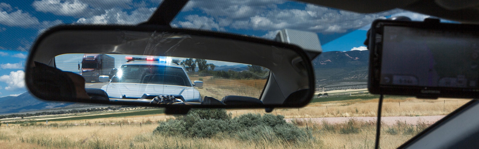 an officer pulls a driver over for using a cellphone