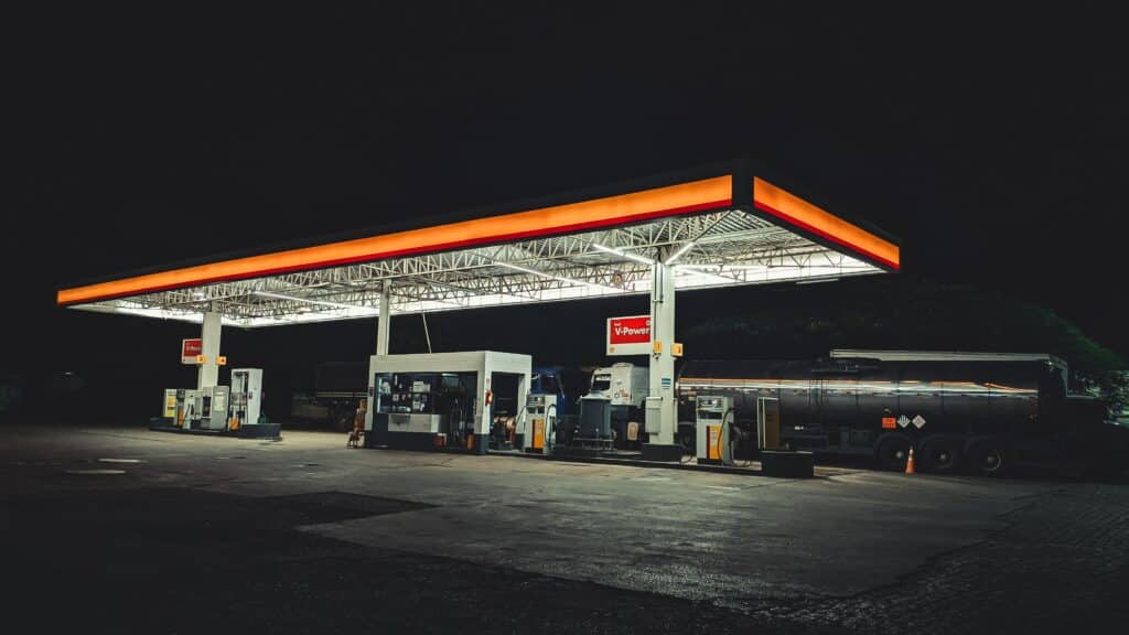 A lone truck from a trucking fleet stops to refill.