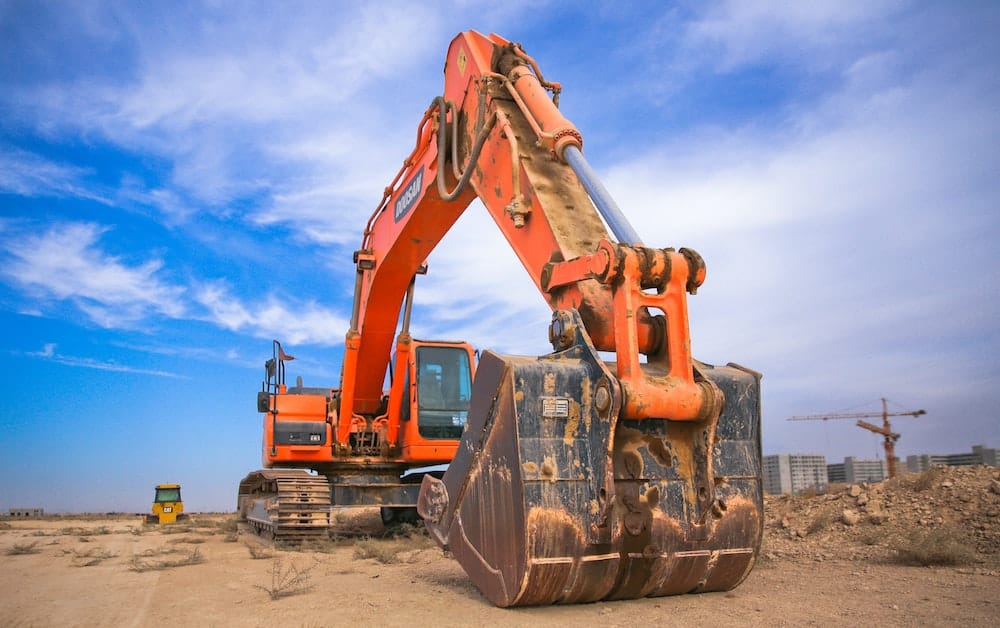 Expensive skidder and heavy equipment on a job site.