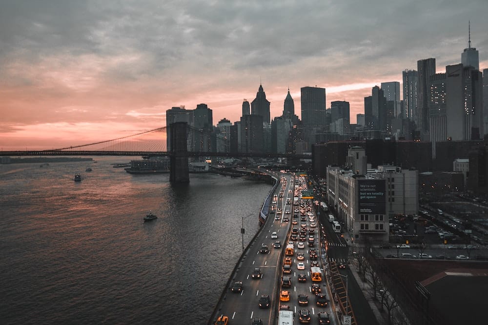 New York Bay Area highway during sunset, pre-EV successful transition for companies and individuals