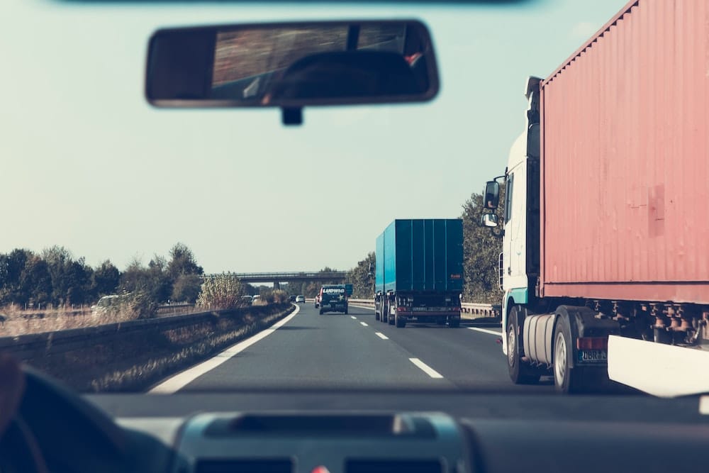 POV of delivery driver using software to help with fuel efficiency, cost management of rising fuel costs