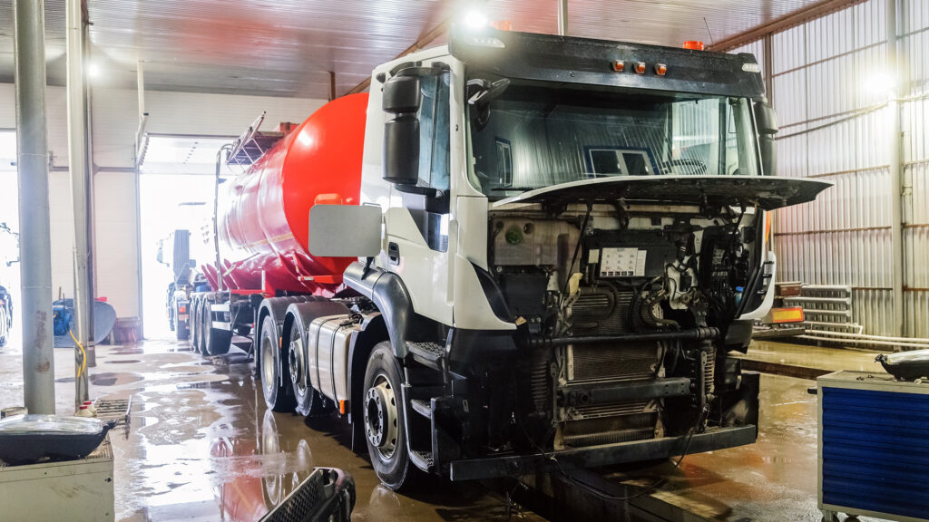 Fuel truck in a maintenance bay.
