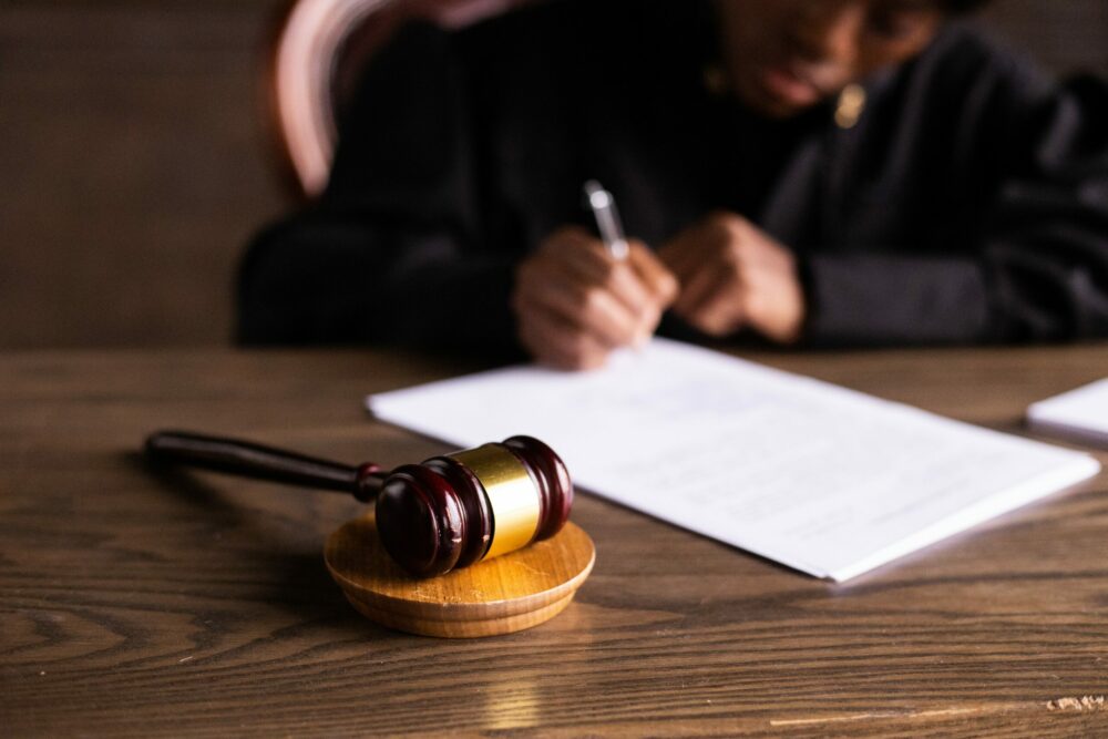 Judge writing a verdict.