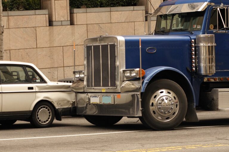 Truck and car fender bender.