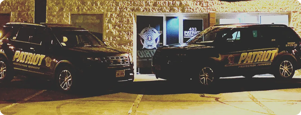 Patriot Protection Services patrol vehicles parked.
