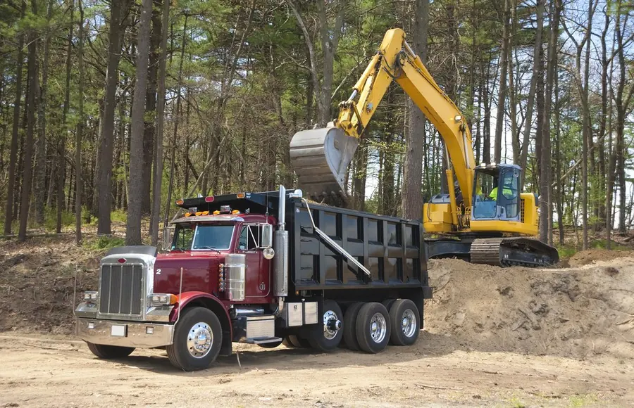 Dump truck loading at a construction site