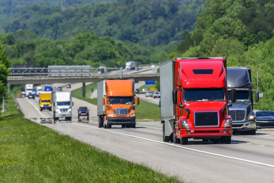 Semi trucks running an interstate lane