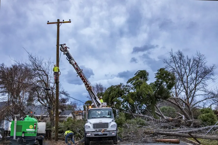 Utility bucket truck working a power line