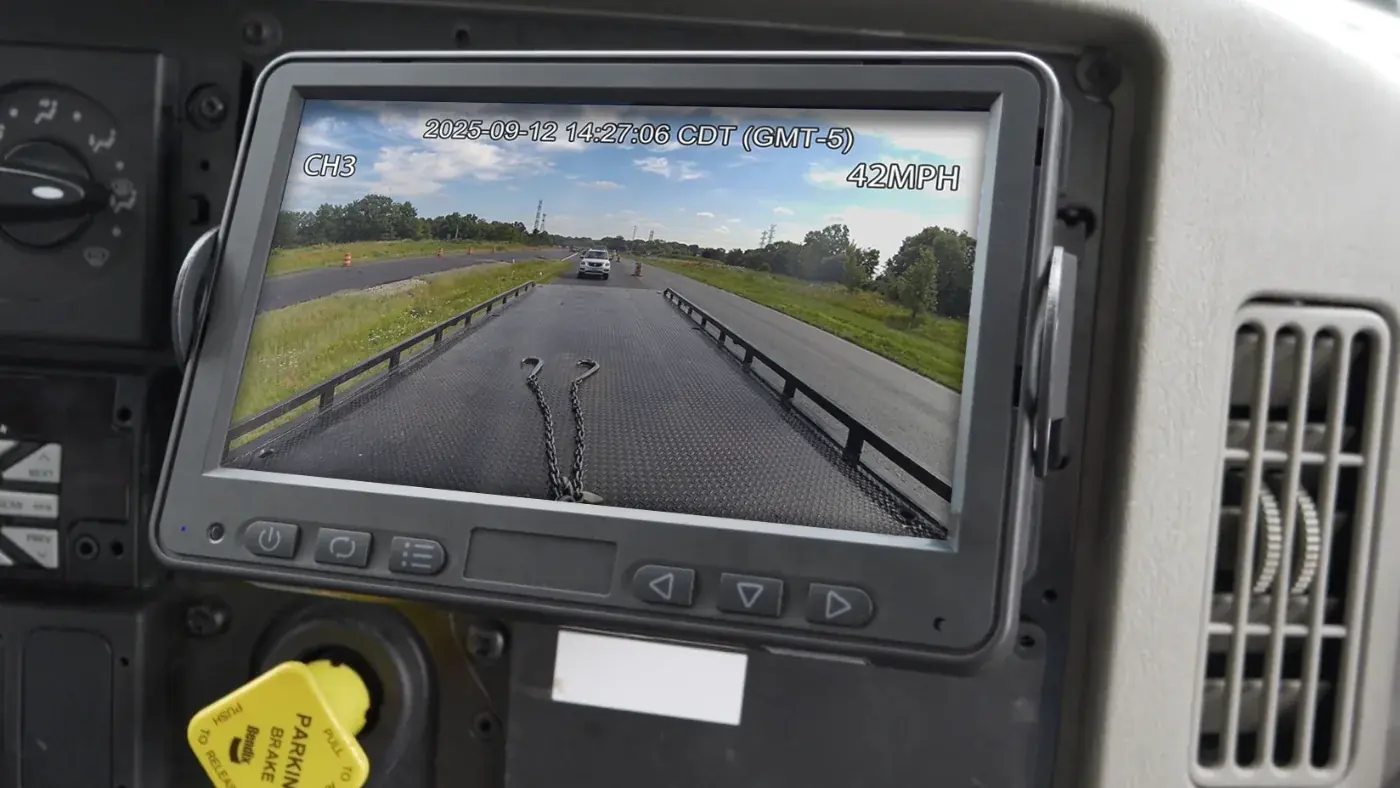 FleetCam LCD installed in an FTS truck, showing the rear camera view