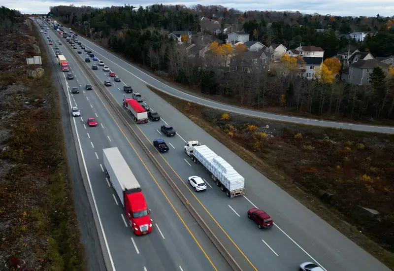 Light and heavy-duty fleet vehicles on a highway